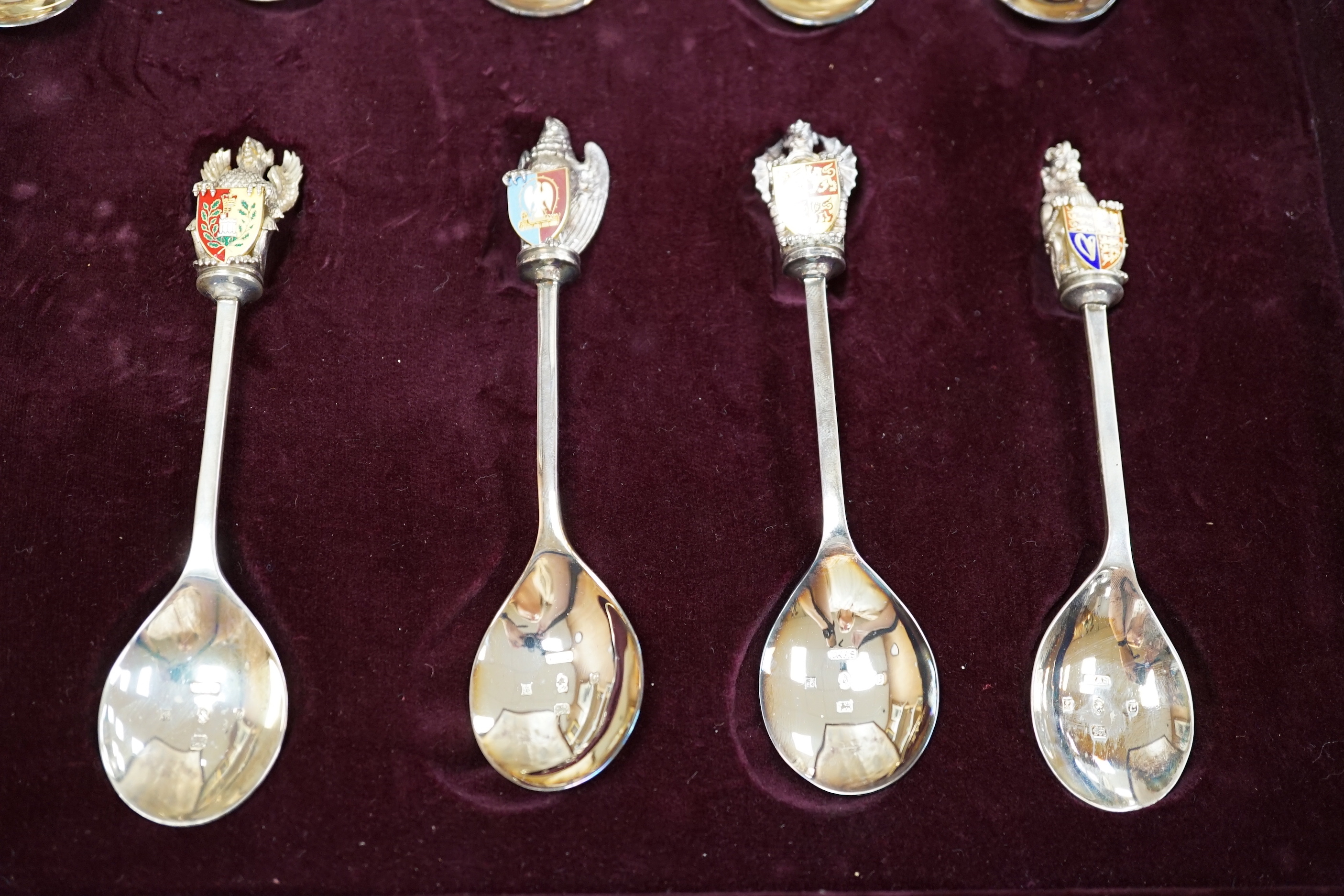 A modern limited edition cased set of ten silver and enamel 'The Queens Beasts Spoons', by Toye, Kenning & Spencer, no. 345/2500.